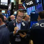 Dow closes 198 pts higher as US stocks close mixed ahead of earnings