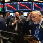 Nasdaq falls 2.6% as AI spending fears hit tech stocks, oil prices jump
